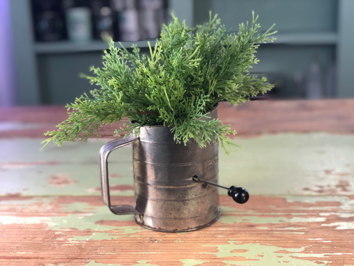 Vintage Black Handled Sifter with Greenery