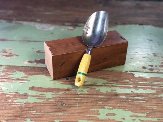 Vintage Yellow Handled Scoop